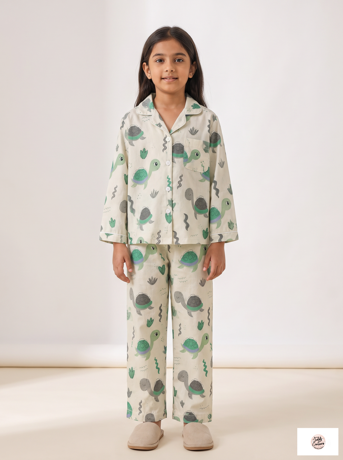 Turtle Tales night suit worn by a child, front view